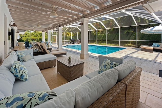 13453 SW 58th Ave, Pinecrest, FL 33156 - swimming pool with an outdoor hangout area, a patio, and a ceiling fan