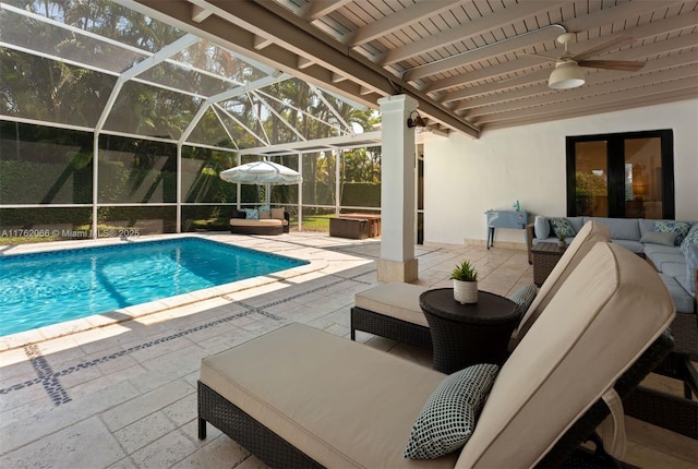 13453 SW 58th Ave, Pinecrest, FL 33156 - swimming pool with outdoor lounge area, a patio, and a ceiling fan