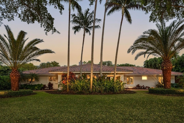 13453 SW 58th Ave, Pinecrest, FL 33156 - view of front of property featuring a tiled roof, stucco siding, and a front lawn