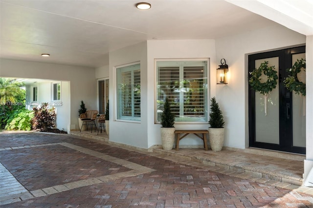 13453 SW 58th Ave, Pinecrest, FL 33156 - doorway to property with stucco siding