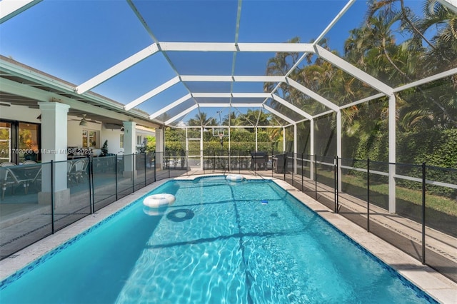 13453 SW 58th Ave, Pinecrest, FL 33156 - view of swimming pool featuring a patio area, ceiling fan, and a lanai