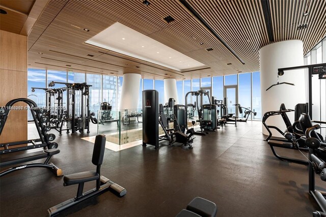 300 Biscayne Blvd Way Unit 3707, Miami, FL 33131 - workout area with a tray ceiling and expansive windows