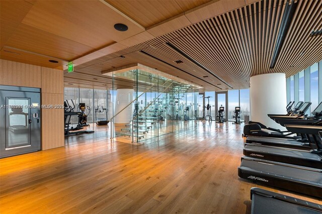 300 Biscayne Blvd Way Unit 3707, Miami, FL 33131 - workout area featuring expansive windows, wood ceiling, and wood finished floors