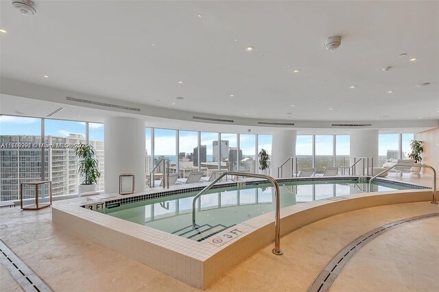 300 Biscayne Blvd Way Unit 3707, Miami, FL 33131 - view of swimming pool with a city view and a hot tub