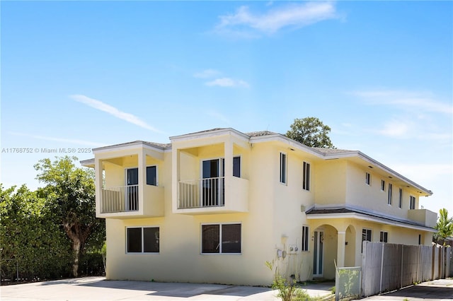3524 NW 4th Ter, Miami, FL 33125 - view of front of property featuring fence and stucco siding