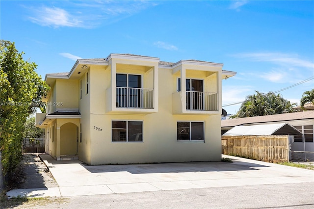 3524 NW 4th Ter, Miami, FL 33125 - view of front of home featuring stucco siding and fence