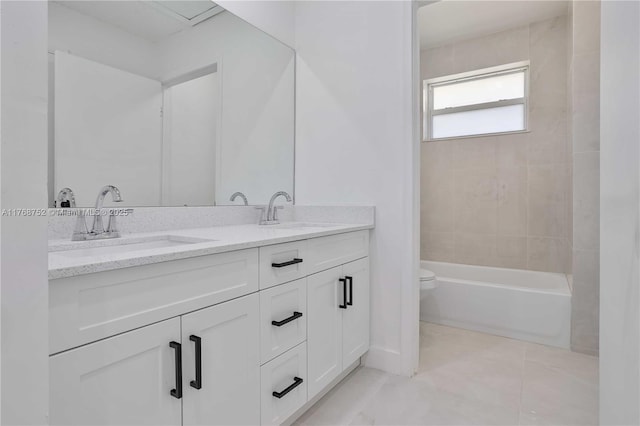 3524 NW 4th Ter, Miami, FL 33125 - bathroom featuring double vanity, tile patterned flooring, toilet, and a sink