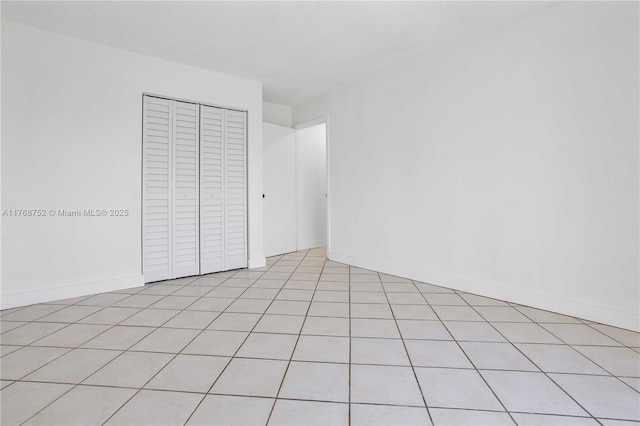 3524 NW 4th Ter, Miami, FL 33125 - unfurnished bedroom featuring a closet and baseboards