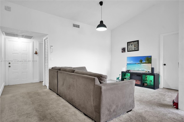 carpeted living area with visible vents