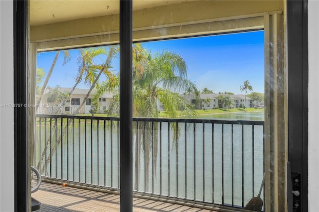 exterior space featuring a water view and a residential view