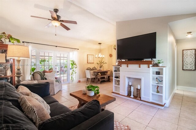 5950 NW 192nd St, Hialeah, FL 33015 - living area featuring light tile patterned flooring, lofted ceiling, baseboards, ceiling fan, and a chandelier