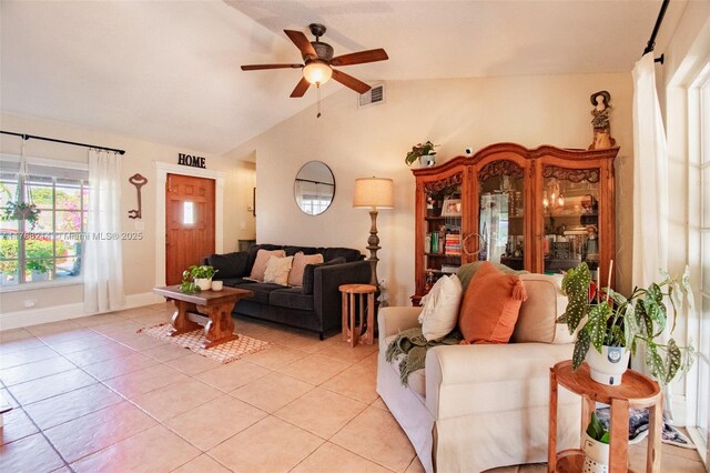 5950 NW 192nd St, Hialeah, FL 33015 - living room featuring ceiling fan, lofted ceiling, light tile patterned floors, and baseboards