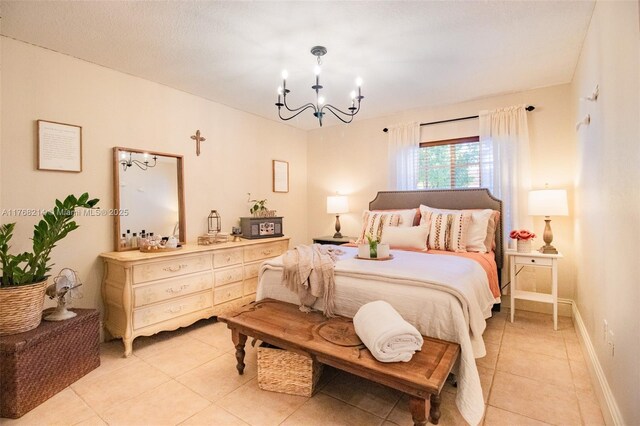 5950 NW 192nd St, Hialeah, FL 33015 - bedroom with a chandelier, light tile patterned flooring, and baseboards