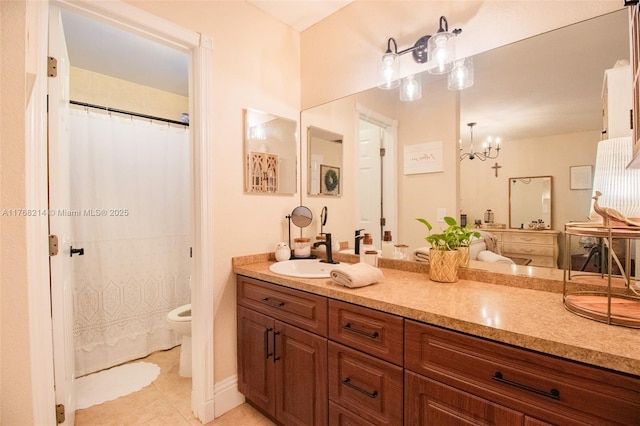 5950 NW 192nd St, Hialeah, FL 33015 - bathroom with tile patterned flooring, toilet, vanity, and a chandelier