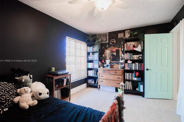 5950 NW 192nd St, Hialeah, FL 33015 - bedroom with tile patterned floors, ceiling fan, and baseboards