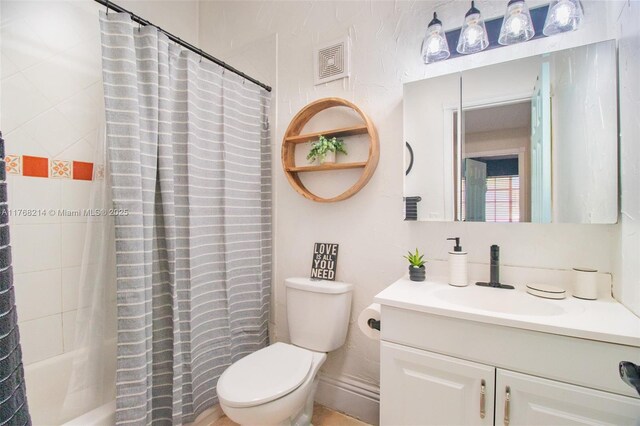 5950 NW 192nd St, Hialeah, FL 33015 - full bath with toilet, vanity, and shower / bathtub combination with curtain