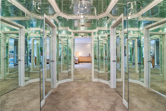 21109 NE 38th Ave Unit 74, Aventura, FL 33180 - bathroom featuring a notable chandelier, carpet flooring, and french doors