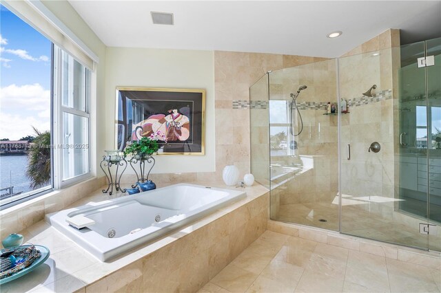 21109 NE 38th Ave Unit 74, Aventura, FL 33180 - bathroom featuring a shower stall and a jetted tub