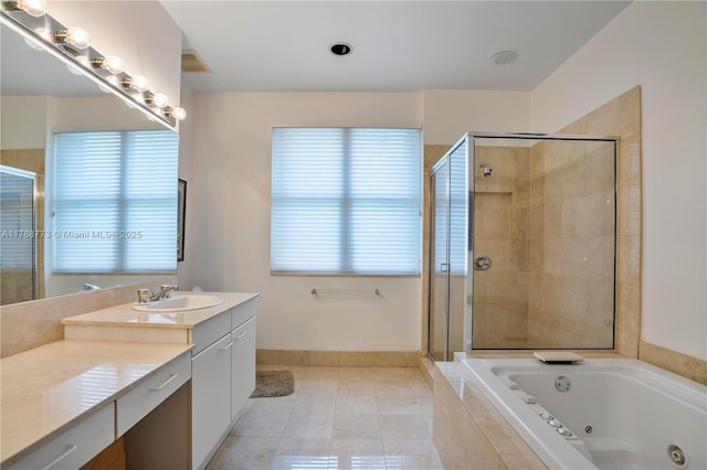 21109 NE 38th Ave Unit 74, Aventura, FL 33180 - full bath featuring vanity, baseboards, tile patterned flooring, a shower stall, and a jetted tub