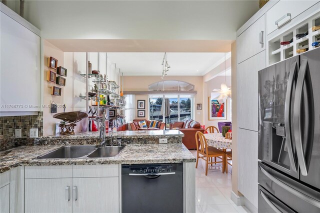 21109 NE 38th Ave Unit 74, Aventura, FL 33180 - kitchen with stainless steel fridge with ice dispenser, a sink, decorative backsplash, black dishwasher, and white cabinetry