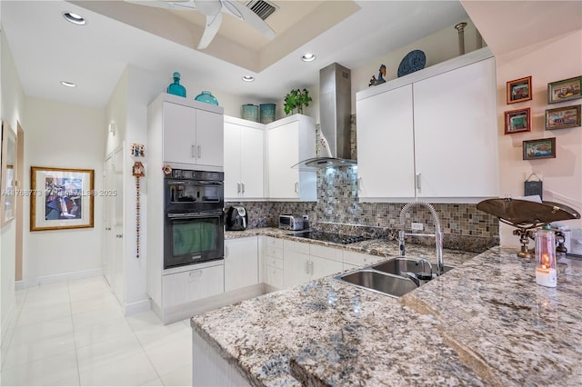 21109 NE 38th Ave Unit 74, Aventura, FL 33180 - kitchen featuring light stone countertops, a sink, black appliances, wall chimney exhaust hood, and backsplash
