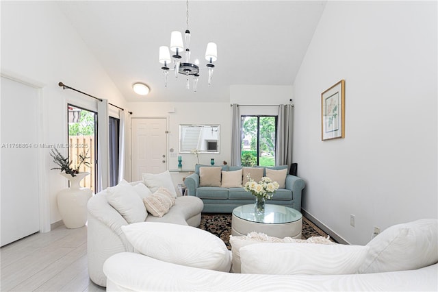 4016 Palm Bay Cir Unit C, West Palm Beach, FL 33406 - living room with a chandelier and high vaulted ceiling