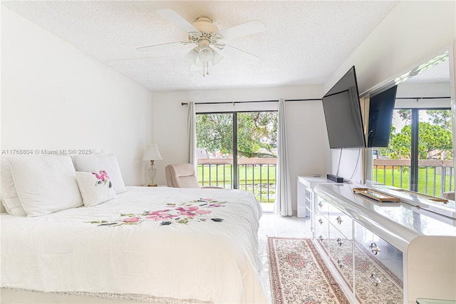 4016 Palm Bay Cir Unit C, West Palm Beach, FL 33406 - bedroom with a textured ceiling, access to outside, multiple windows, and ceiling fan
