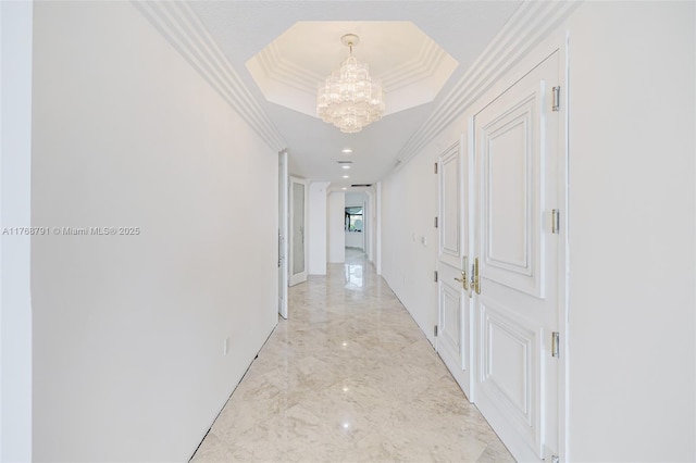 550 SE 5th Ave Unit 606S, Boca Raton, FL 33432 - hall featuring a chandelier, light marble finish floors, ornamental molding, a raised ceiling, and recessed lighting
