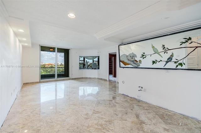 550 SE 5th Ave Unit 606S, Boca Raton, FL 33432 - spare room featuring recessed lighting, marble tiled flooring, baseboards, and crown molding