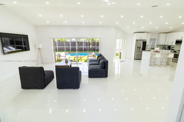 living room with visible vents and recessed lighting