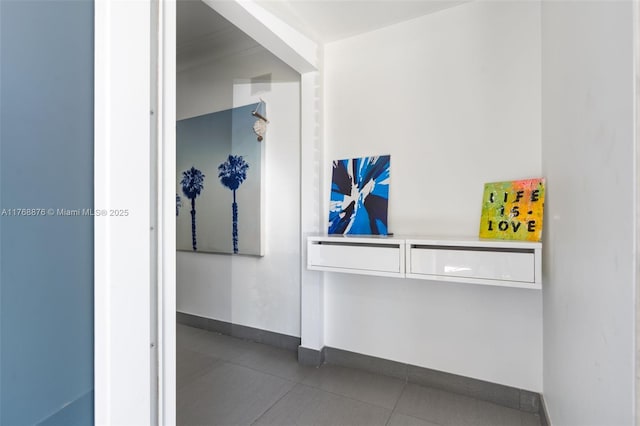 501 NE 51st St, Miami, FL 33137 - hallway with baseboards and tile patterned floors