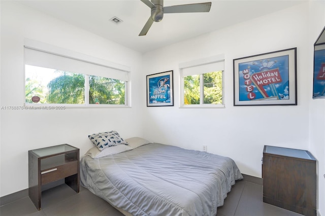 501 NE 51st St, Miami, FL 33137 - bedroom featuring multiple windows and ceiling fan