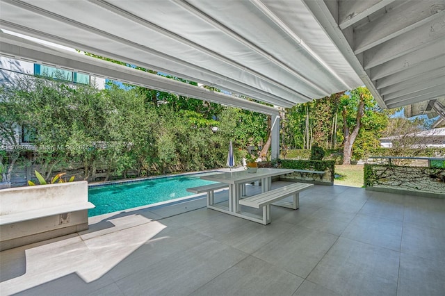 outdoor pool featuring a patio area