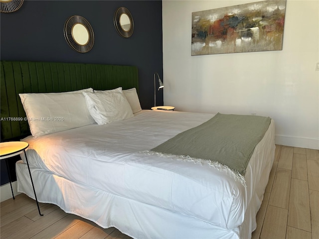 2600 E Hallandale Beach Blvd Unit T2202, Hallandale Beach, FL 33009 - bedroom featuring wood finish floors and baseboards
