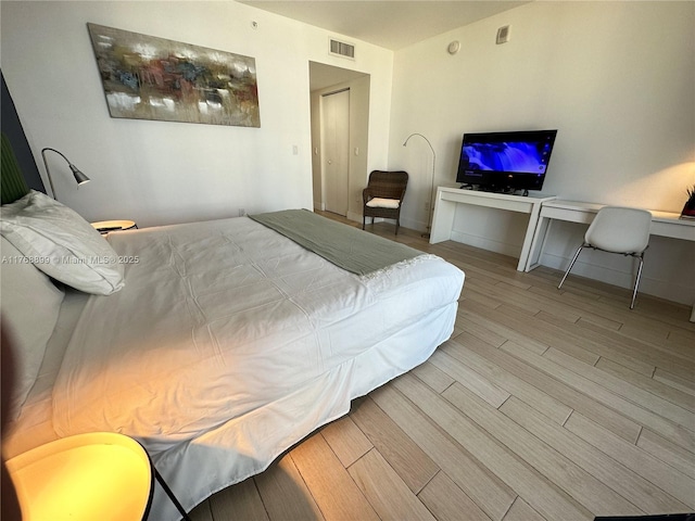 2600 E Hallandale Beach Blvd Unit T2202, Hallandale Beach, FL 33009 - bedroom with wood finished floors and visible vents