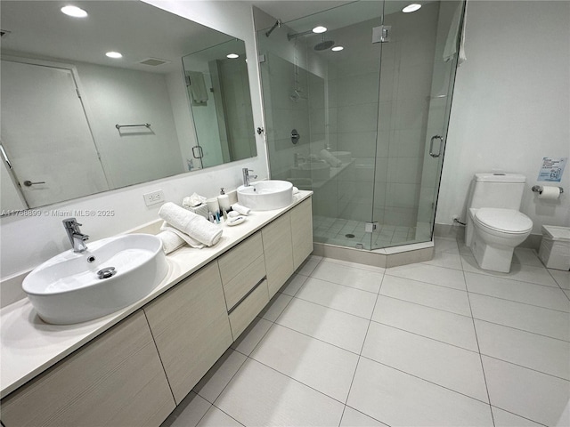 2600 E Hallandale Beach Blvd Unit T2202, Hallandale Beach, FL 33009 - bathroom featuring recessed lighting, a shower stall, a sink, and tile patterned flooring