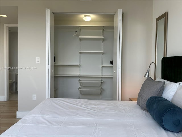 2600 E Hallandale Beach Blvd Unit T2202, Hallandale Beach, FL 33009 - bedroom with light wood-type flooring and baseboards