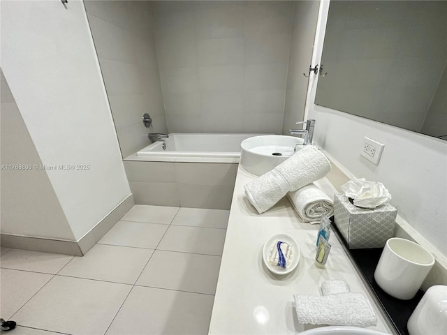 2600 E Hallandale Beach Blvd Unit T2202, Hallandale Beach, FL 33009 - bathroom featuring tile patterned flooring, a sink, baseboards, and a relaxing tiled tub