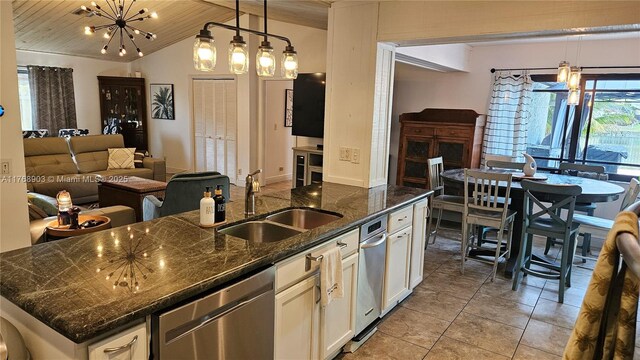 interior space featuring light countertops, white cabinets, and baseboards