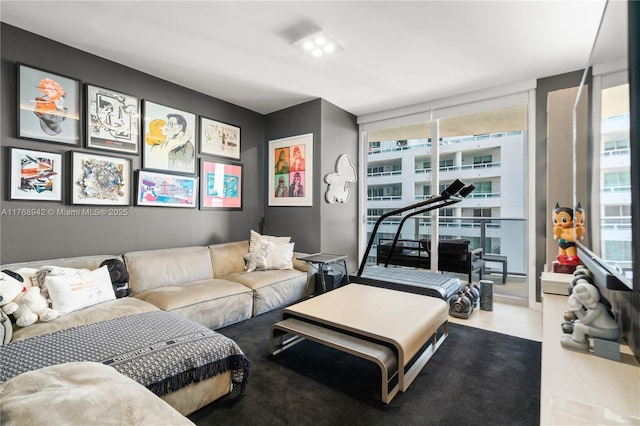 living area with a wall of windows