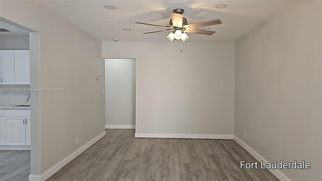 442 SW 22nd Ave, Fort Lauderdale, FL 33312 - spare room featuring ceiling fan, wood finished floors, and baseboards