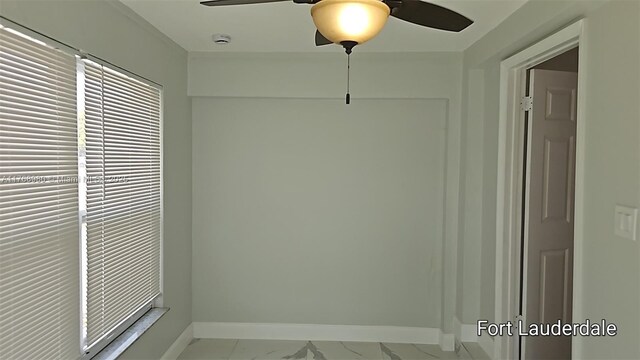 442 SW 22nd Ave, Fort Lauderdale, FL 33312 - interior space featuring ceiling fan, baseboards, and marble finish flooring