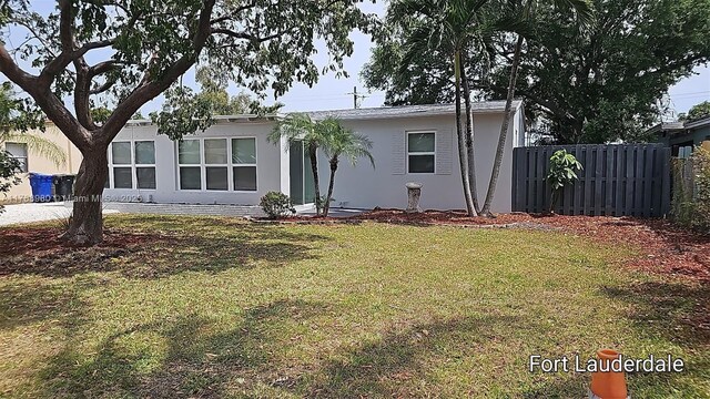 442 SW 22nd Ave, Fort Lauderdale, FL 33312 - view of front facade with stucco siding