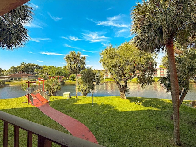 1103 NW 58th Ter Unit 224, Sunrise, FL 33313 - view of community featuring a water view and a yard