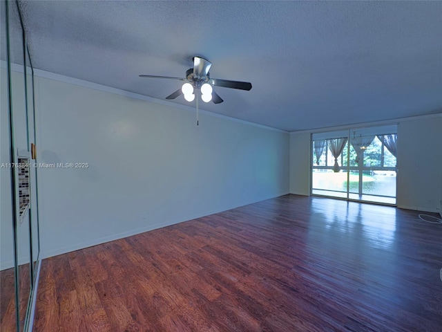 1103 NW 58th Ter Unit 224, Sunrise, FL 33313 - empty room featuring ornamental molding, wood finished floors, ceiling fan, baseboards, and a textured ceiling