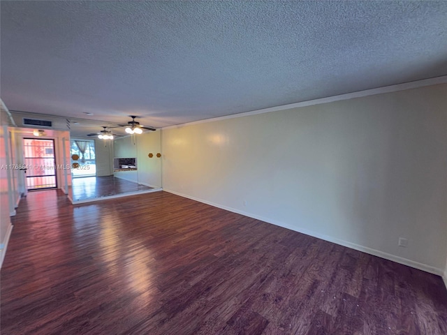 1103 NW 58th Ter Unit 224, Sunrise, FL 33313 - unfurnished living room featuring dark wood finished floors, a textured ceiling, baseboards, ornamental molding, and ceiling fan