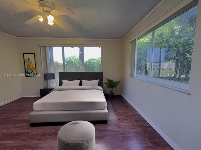 1103 NW 58th Ter Unit 224, Sunrise, FL 33313 - bedroom with a textured ceiling, ornamental molding, baseboards, wood finished floors, and ceiling fan
