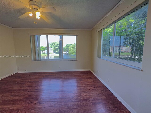 1103 NW 58th Ter Unit 224, Sunrise, FL 33313 - empty room featuring a textured ceiling, crown molding, wood finished floors, ceiling fan, and baseboards