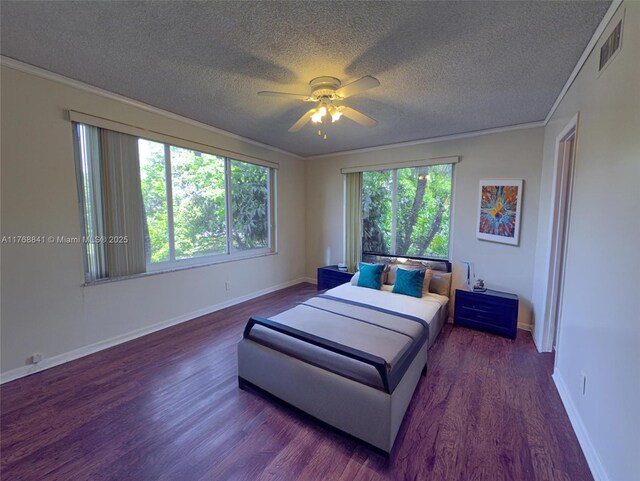 1103 NW 58th Ter Unit 224, Sunrise, FL 33313 - bedroom featuring dark wood-style floors, a textured ceiling, ornamental molding, baseboards, and ceiling fan