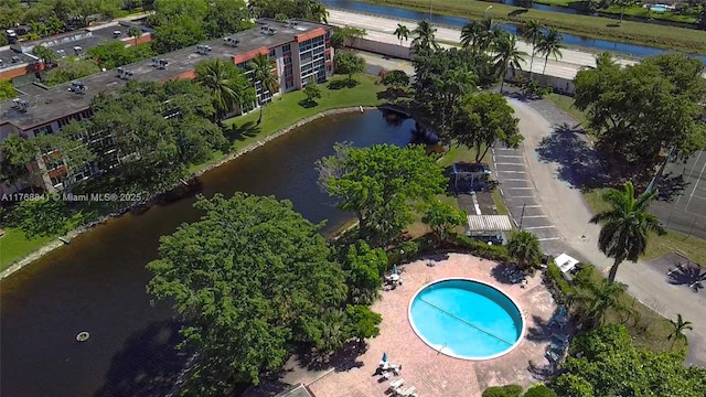 1103 NW 58th Ter Unit 224, Sunrise, FL 33313 - drone / aerial view of a pool area and a nearby body of water
